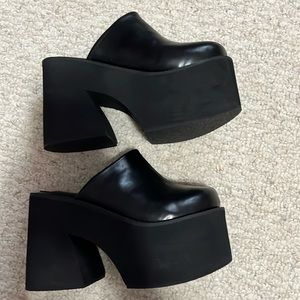 black platform mules